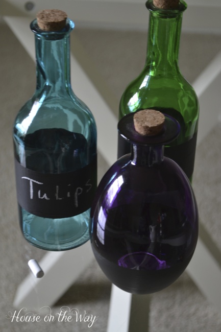 chalkboard labeled glass bottles, chalkboard paint, crafts, Chalkboard labels are a quick and easy update to plain glass bottles