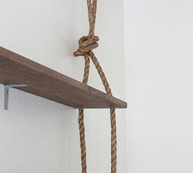 rustic diy wall shelving, diy, how to, shelving ideas, woodworking projects, Using large hook screws to hang the rope Since the rope is only for aesthetics we were able to use these hook screws are not worry about the weight of the shelves The shelves are sturdily in place because of the braces
