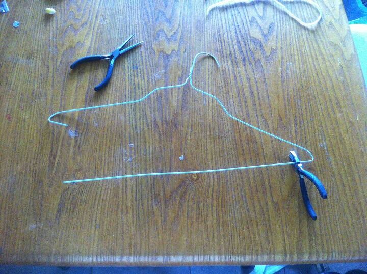 handmade long bow and arrows for 18 dolls, crafts, Using wire cutters cut the bottom off from a wire hanger