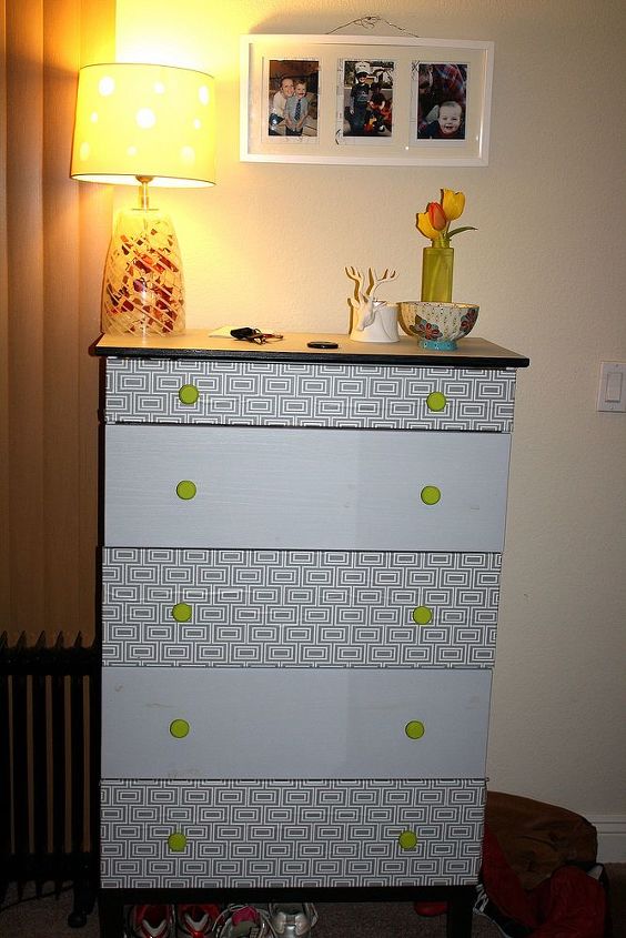 new season new hair new knobs, home decor, painted furniture, This chest use to have the black and gold knobs but the bright green really made this piece a lot more fun and energetic just what our living room needed color