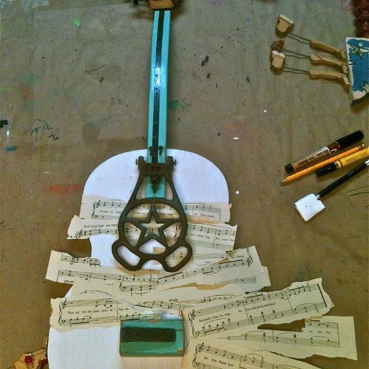 repurposing assemblage art, repurposing upcycling, The second one cut from a salvaged wide barn plank Laying out the notes and lyrics Vintage hardware had been waiting awhile for this new life