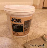 installing a travertine vinyl floor, bathroom ideas, flooring, tile flooring, tiling, premixed vinyl tile grout gives the floor the look of authentic tile
