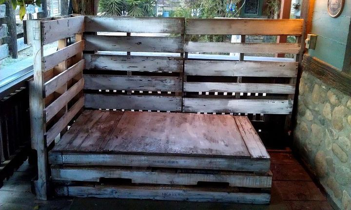 my ranch style rustic pallet daybed, diy, outdoor furniture, outdoor living, painted furniture, pallet, repurposing upcycling, rustic furniture, woodworking projects, All of these pallets are freestanding I just pushed them up against the porch railings and they hold themselves together
