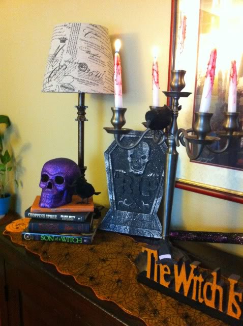 halloween decor, halloween decorations, seasonal holiday d cor, I placed a purple glittered skull on top of books from Goodwill Perfect colors for the season