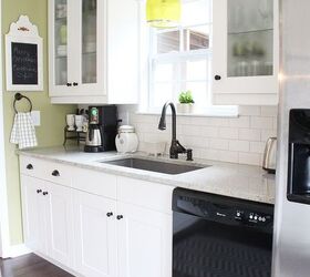 my cottagey ikea kitchen, home decor, kitchen design, kitchen island, shelving ideas, Adel white Shaker cabinets from Ikea with creamy white subway tile and gray grout