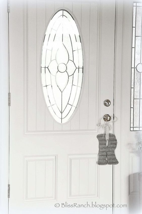 a raised panel entry door receives some no cost cottage charm, doors, The sidelights received the same routed treatment