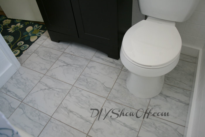 tiled bathroom floor apartment renovation, bathroom ideas, flooring, tile flooring, tiling, bathroom floor after