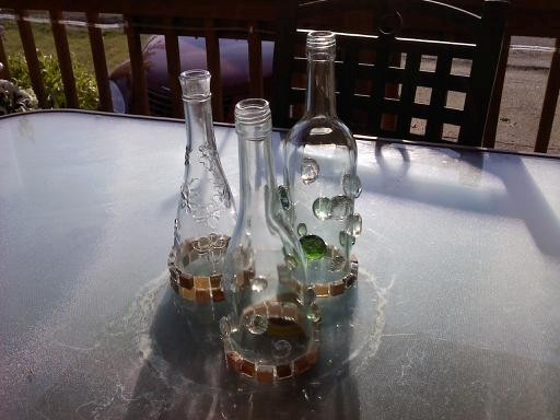 wine bottle lamps, crafts, repurposing upcycling, Different designs I try to use recycled items