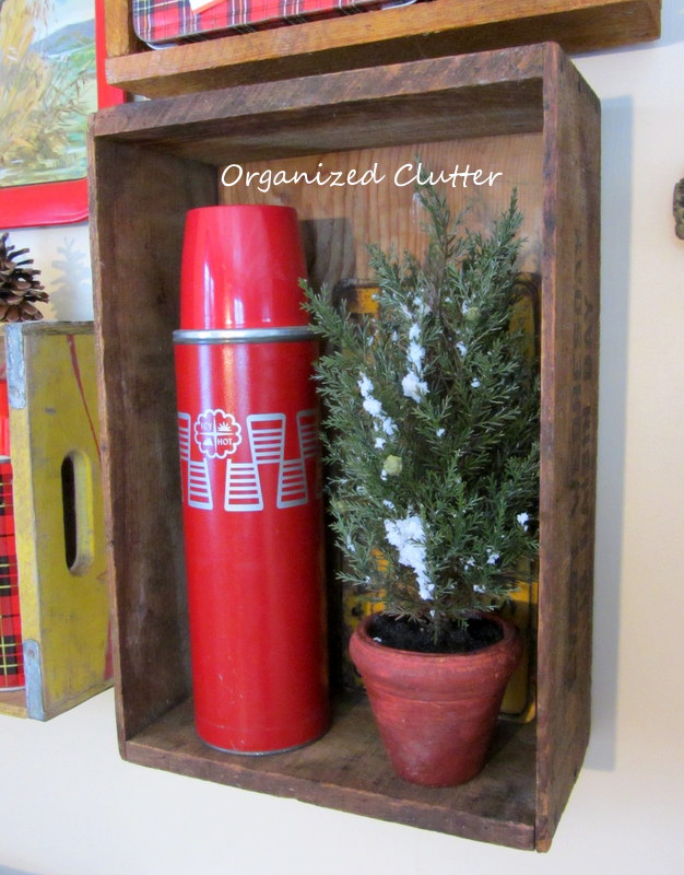 rustic christmas vignettes in the den, seasonal holiday d cor, Junk and crates on a gallery wall