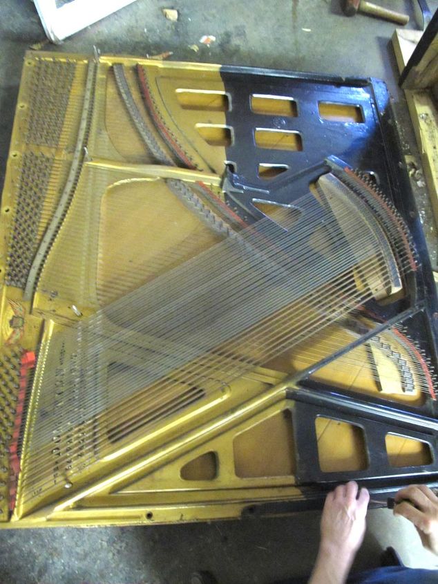 repurposed piano with many options for functionality, I think this will be a piece of wall art on its own It weighs about 250 pounds This would be why pianos are so hard to move Pure Cast iron Visit us at for more repurposing fun