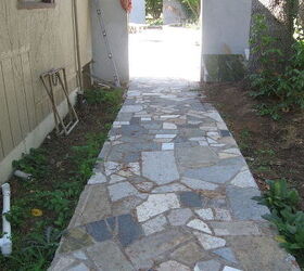patio walkway and wall in stone brick block and granite, concrete masonry, ponds water features, porches, recycling is a must anymore and by useing remnant granite which otherwise would end up in the landfill can be laid inexpensively