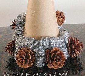 pinecone glitter stems tree, crafts, seasonal holiday decor, and alternate gluing them and the pinecones onto a paper mache tree So quick and easy Starting with a small pinecone I hot glued it on and then placed the twirled stems around the pinecones in alternating directions