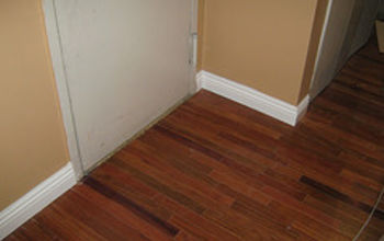 New Wood Flooring, new 3 inch wood base moulding & new Painted Walls