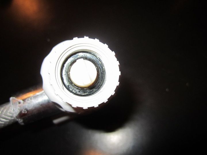 why you need to replace your shower head every 6 months, bathroom ideas, home maintenance repairs, how to, plumbing, The shower head adapter was full of biofilm crust as shown stuck to the rubber o ring