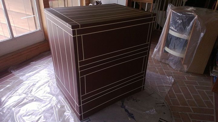 metal cabinet don t toss it turn it into something useful, painted furniture, Masking tape completed Ready for spray paint Get your plastic sheet ready and your cheap white spray paint