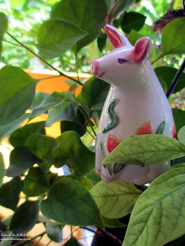 make a whimsical plant accent from vintage salt amp pepper shakers, crafts, gardening, Here s another of my plant pokes made from a vintage salt shaker See the post and directions on my blog at