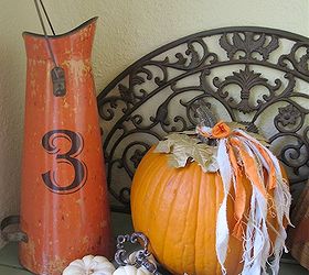 my fall front porch, porches, seasonal holiday decor, This vignette sits on the bench in my entry nook Love the pitcher my lucky is 3 Tied scraps of torn linen around the stem of the pumpkin for a shabby fall look