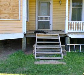 front porch transformation, curb appeal, painting, porches, And this is what we started with A dilapidated rickity mess Kinda scary but Spook our cat didn t mind