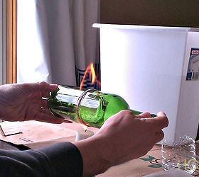 how to cut a glass bottle in half with yarn and fire, crafts, Burn baby burn Just make sure to spin the bottle and get plenty of fire to heat the bottle