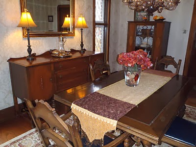 1930 s china cabinet gets a new lease on life, dining room ideas, home decor, painted furniture, With the addition of some new wallpaper in a lighter damask pattern an area rug and new light fixture helped But the room looked dark and dated