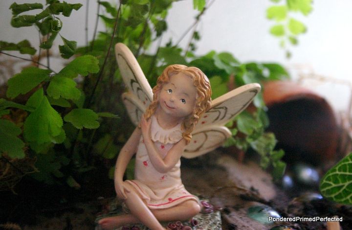 what is it about these tiny little fairy gardens that is so appealing, gardening, home decor, terrarium, This sweet little fairy came from an estate sale for 2