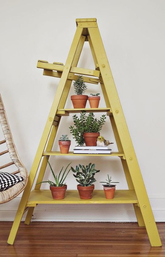 6 new uses for an old ladder, home decor, repurposing upcycling, Display odds and ends Need a place to display your stuff Give your ladder a fresh coat of paint and create tiered shelves by adding a few planks of wood across each set of steps