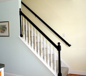 mini makeover paint your banister black, home decor, painting, The contrasting black rail makes a huge difference against the pastel wall colors