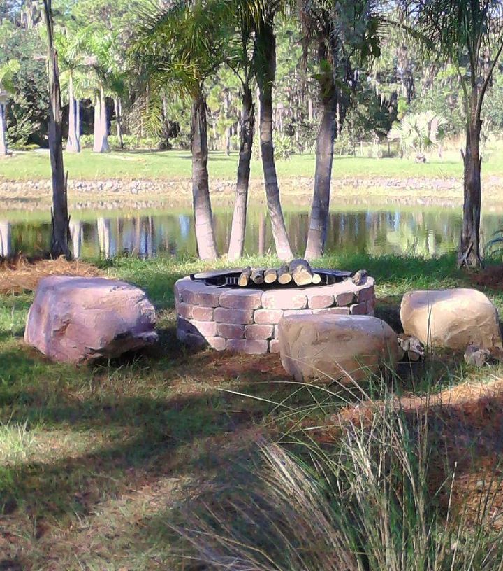 it is fire pit season in florida, landscape, outdoor living, Belgard fire pit with sitting boulders