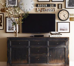 10 tips for creating a collected gallery wall, diy, home decor, wall decor, I love the signs and clock faces mixed with art Photo via Pottery Barn