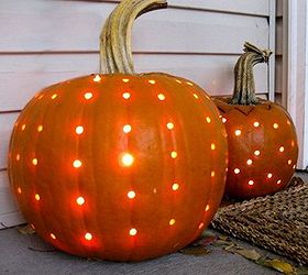 pumpkin carving ideas inspiration, seasonal holiday d cor, thanksgiving decorations, Use a drill with a small bit to create these polka dotted pumpkins lit from within