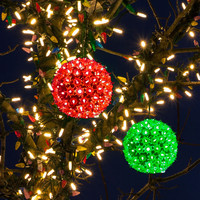 how to create an inexpensive backyard wedding, outdoor living, Another Christmas Lights Etc find These spheres can be purchased in white or multi colored options to add a bit of lit charm to the night Also looks great after the ceremony hanging on the archway