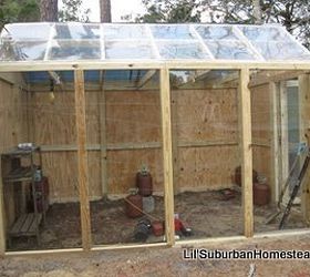the mostly recycled greenhouse for under 400 00, diy, gardening, outdoor living, repurposing upcycling, We reused some refrigerant tanks and filled them with water to use as heat synchs they heated the space in the daytime and help keep the greenhouse temperate at night time