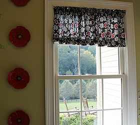 my laundry room got happy, home decor, laundry rooms, shelving ideas, Another shot of my valance and plates You don t have to sew to make this valance Fabric glue good iron and a steady hand is all that is needed