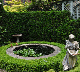 a romantic garden in the heart of the city, gardening, A small pond at the centre of one of the garden rooms