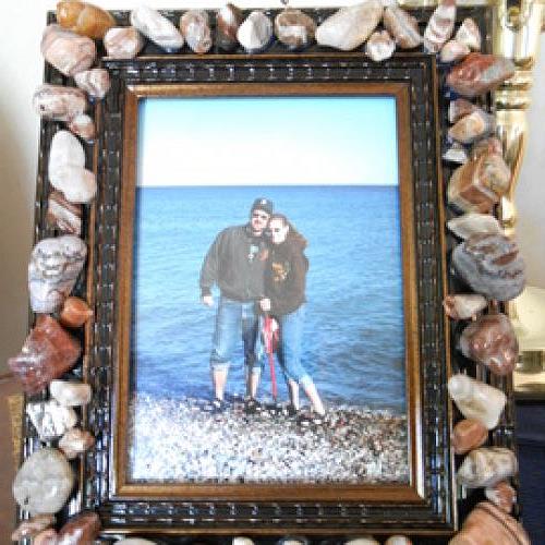 my lake superior rock collection, crafts, home decor, pallet, repurposing upcycling, my hubby and I on the shores of L S The rocks on this frame are some of our favorites we collected along the way
