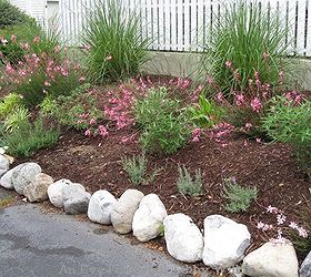 adding large rocks to edge the garden area, landscape, outdoor living