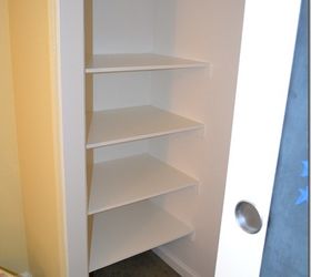 7 simple steps to create cheap easy built in closet storage, cleaning tips, closet, diy, shelving ideas, storage ideas, Next I placed the shelves on top of the supports and used finishing nails and a hammer to secure the shelves to the wall supports After that I threw on two coats of high gloss white paint to finish them off Pretty pretty