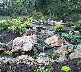 outdoor living water garden, outdoor living, patio, ponds water features, pondless waterfall between pool and patio areas