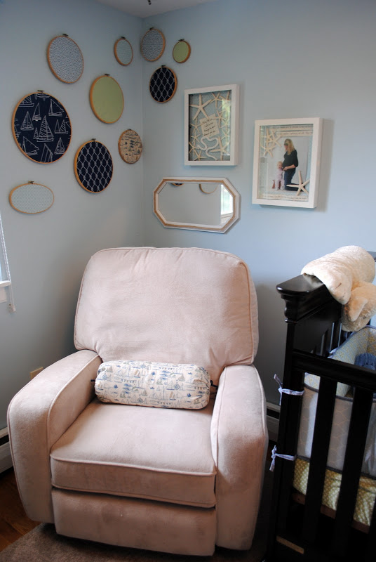 the nautical nursery that changed our lives, bedroom ideas, home decor, The AFTER Rope trimmed mirror starfish shadow boxes and a sailboat bolster provide tons of beachy looking comfort