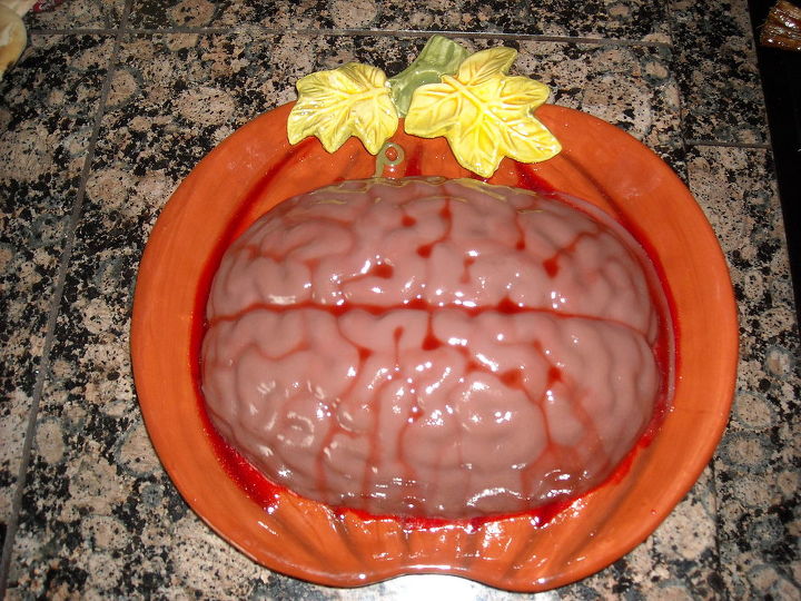 halloween hauntings, halloween decorations, seasonal holiday d cor, Sit down and have a bite to eat strawberry peach jello green food coloring and a little milk complete this dish