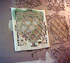tin ceiling tile look for almost free with plaster and paint, Ok this takes some practice But you can DO IT Get your ladder Load up the trowel with plaster Place the stencil on the ceiling Draw the trowel across the stencil leaving the voids in the stencil filled with plaster