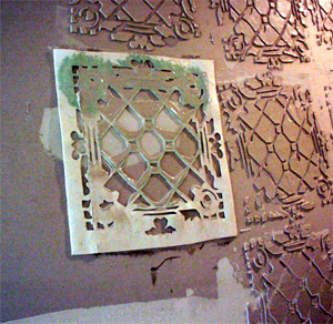 tin ceiling tile look for almost free with plaster and paint, Ok this takes some practice But you can DO IT Get your ladder Load up the trowel with plaster Place the stencil on the ceiling Draw the trowel across the stencil leaving the voids in the stencil filled with plaster