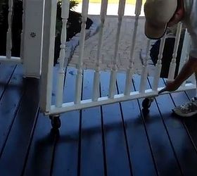make a rolling gate for your porch, curb appeal, diy, how to, porches, Attaching casters to the bottom of a section of rail creates a rolling gate