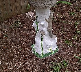 old birdbath redo, outdoor living, pets animals, I painted it white and saw little details I didn t notice before so I painted the squirrels and added some greenery