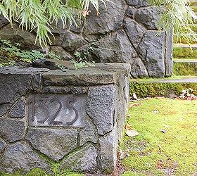 boulder retaining wall, concrete masonry, outdoor living, Ross NW Watergardens Portland Landscaper veneered existing walls with basalt A split
