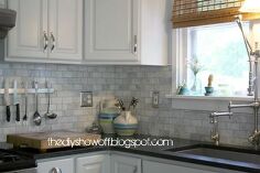 we re in the process of transforming our kitchen on a budget to fit our style we, home improvement, kitchen backsplash, kitchen design, kitchen island, We removed the old blue laminate counters and installed Virginia Jet Mist granite and small marble subway tile backsplash