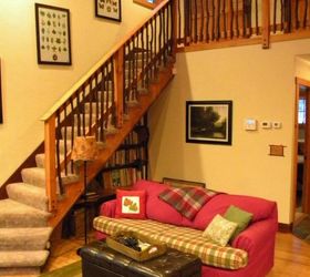 cozy cabin in the woods retreat and fallingwater, home decor, A bookcase was artfully tucked under the staircase
