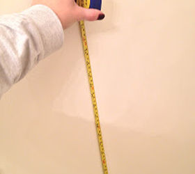 painting horizontal stripes on a wall, painting, Measure from the floor up to get the placement of the lowest stripe and mark with a pencil