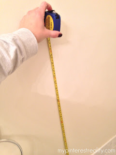 painting horizontal stripes on a wall, painting, Measure from the floor up to get the placement of the lowest stripe and mark with a pencil