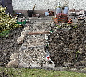 rockery, gardening, landscape, This is me putting the field stones down the edge of the steps had to go looking for these round all the farmers fields